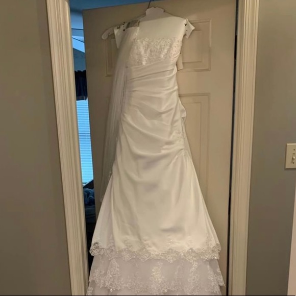 David's Bridal white strapless satin wedding dress and veil